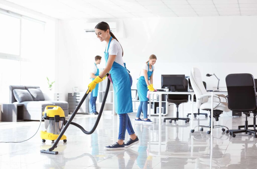 Coast House Cleaning team efficiently cleaning a commercial space in Goleta, CA, ensuring a pristine and professional environment.