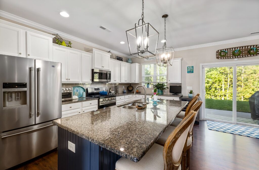 A Coast House Cleaning professional cleaning a living room in Montecito, CA, ensuring a spotless home.